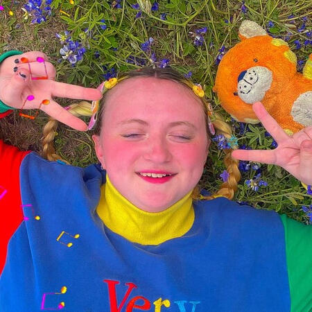 me lying in a field of flowers with Tak